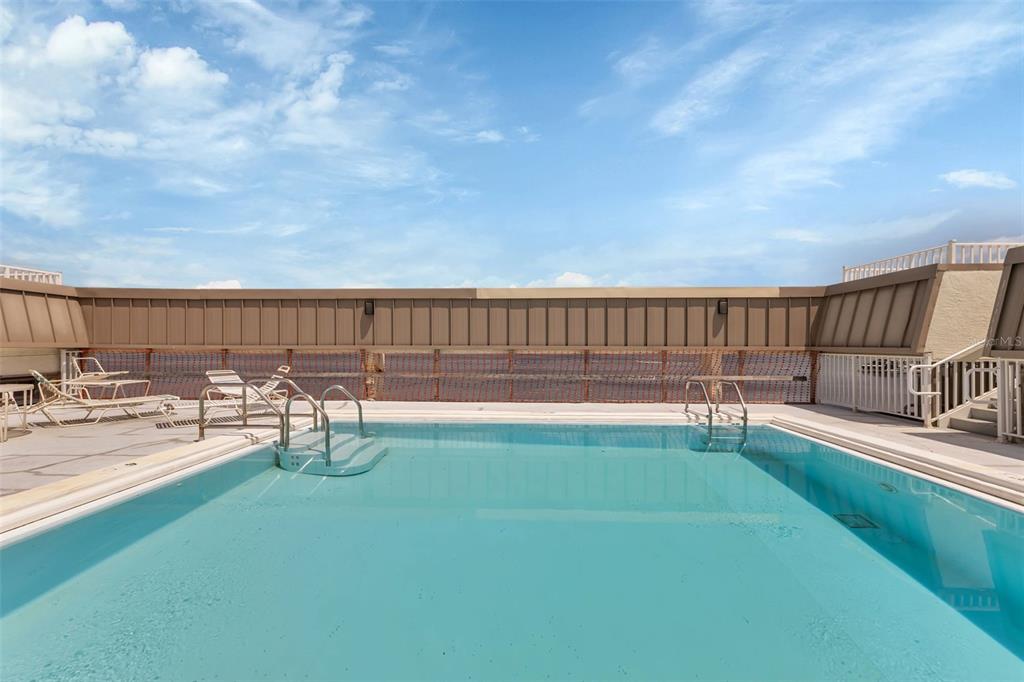 1500 Park Beach Circle, Unit 3B Punta Gorda, FL 33950 - Photo 34 of 57 a view of a swimming pool with a yard