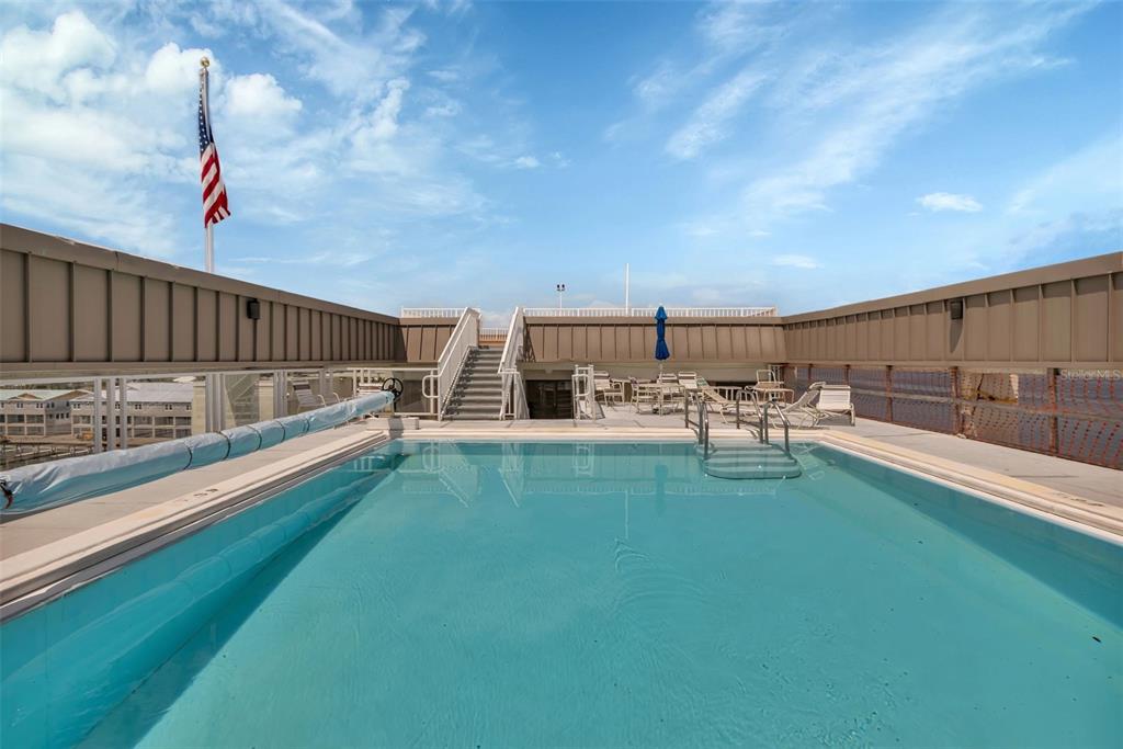 1500 Park Beach Circle, Unit 3B Punta Gorda, FL 33950 - Photo 35 of 57 a view of swimming pool with outdoor seating and plants