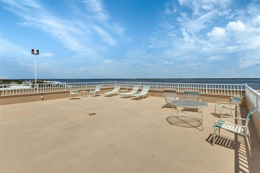 1500 Park Beach Circle, Unit 3B Punta Gorda, FL 33950 - Photo 39 of 57 a view of a swimming pool and an outdoor seating