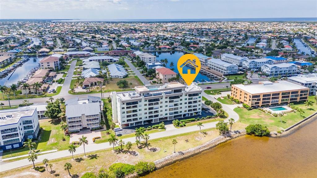 1500 Park Beach Circle, Unit 3B Punta Gorda, FL 33950 - Photo 45 of 57 an aerial view of residential houses with outdoor space