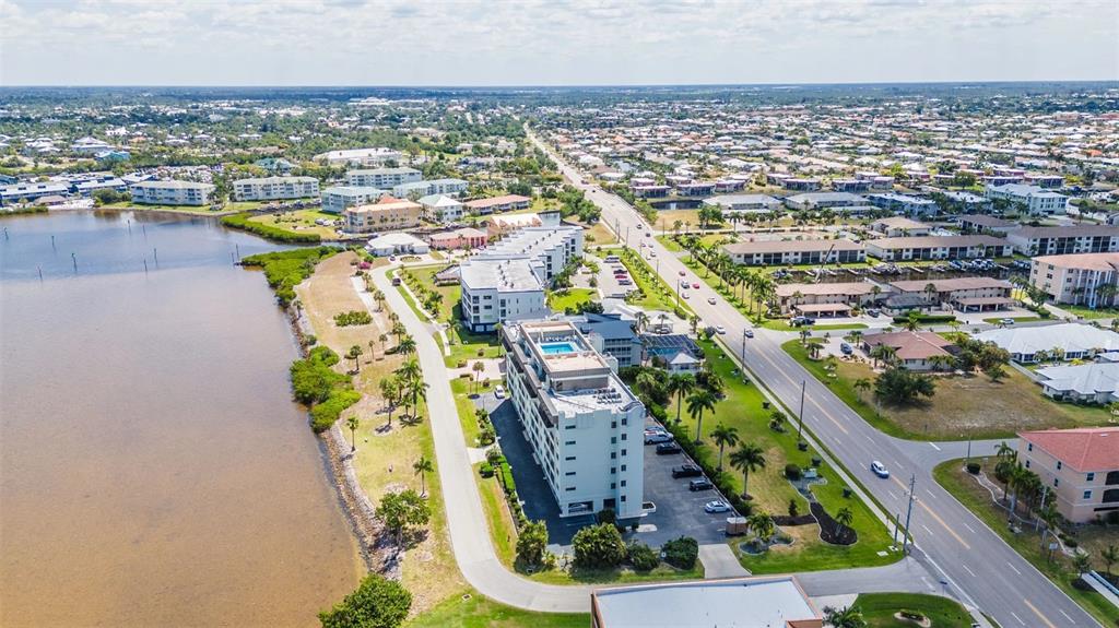 1500 Park Beach Circle, Unit 3B Punta Gorda, FL 33950 - Photo 52 of 57 an aerial view of residential houses with outdoor space