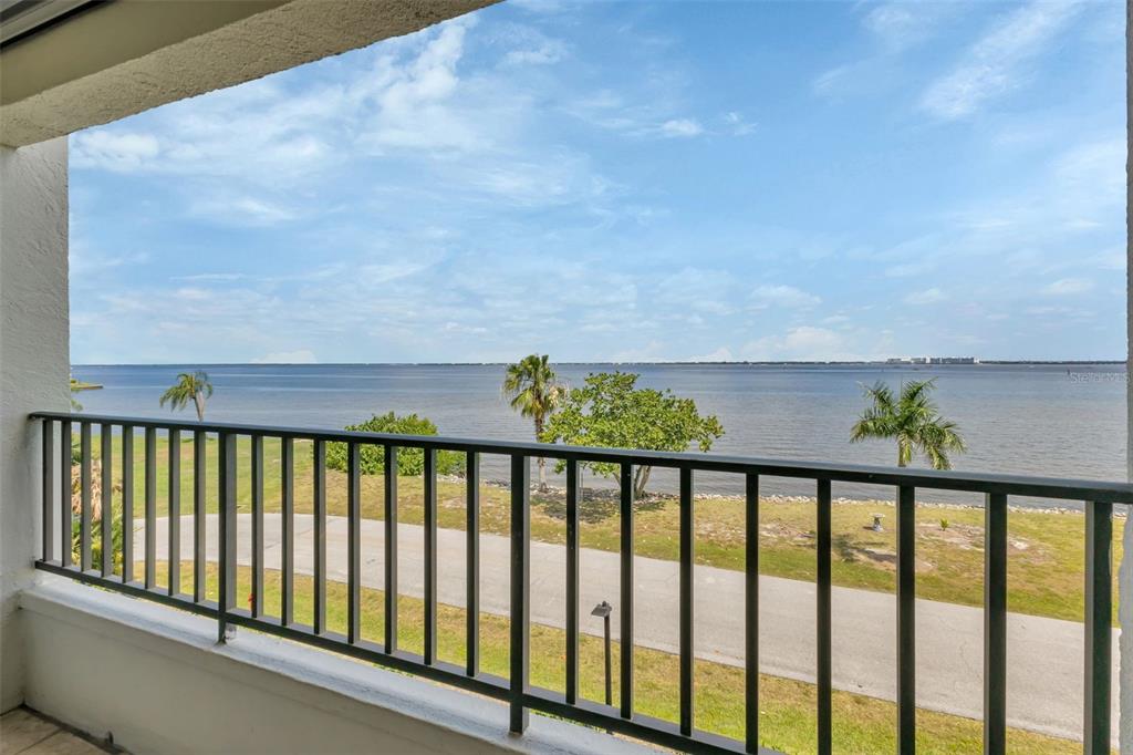 1500 Park Beach Circle, Unit 3B Punta Gorda, FL 33950 - Photo 10 of 57 a balcony with table