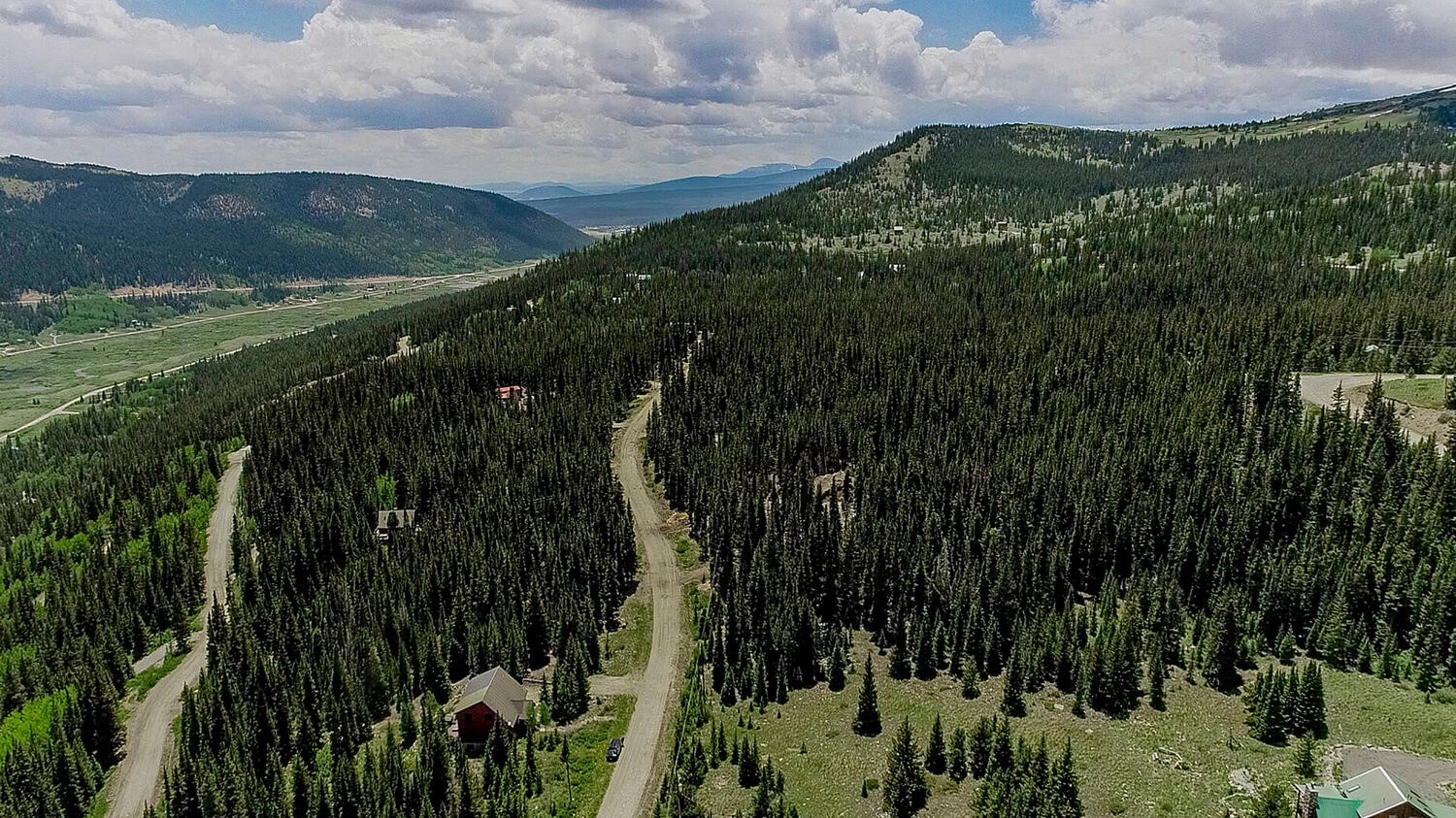 127 Ansley Road Alma, CO 80420 - Photo 16 of 21 Drone / aerial view featuring a mountain view and a view of trees