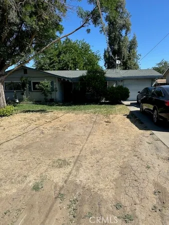 a view of a backyard of a house