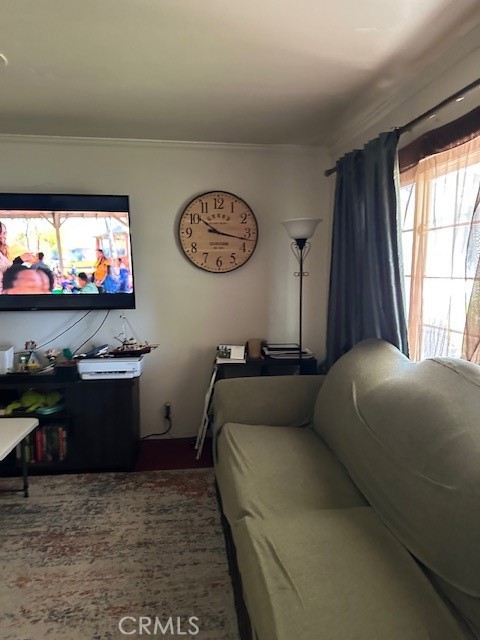 891 Hansen Avenue Merced, CA 95340 - Photo 2 of 6 a bed room with a bed and a flat tv screen