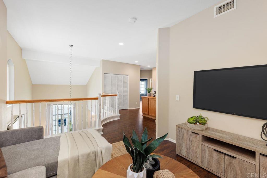 160 Belflora Way Oceanside, CA 92057 - Photo 19 of 41 a living room with furniture and a flat screen tv
