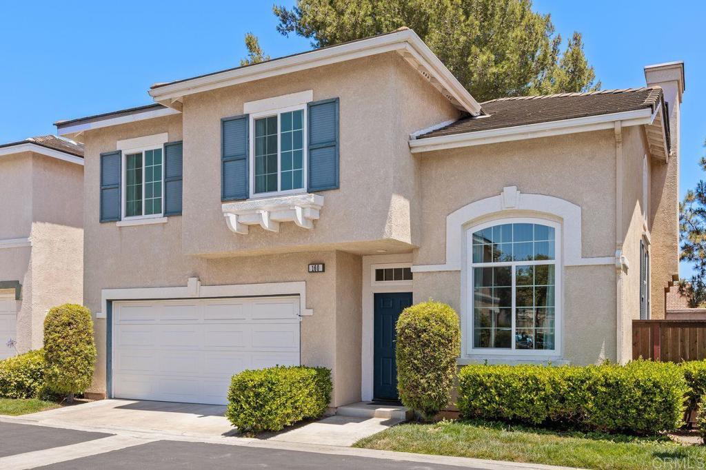 160 Belflora Way Oceanside, CA 92057 - Photo 2 of 41 a front view of a house with garden