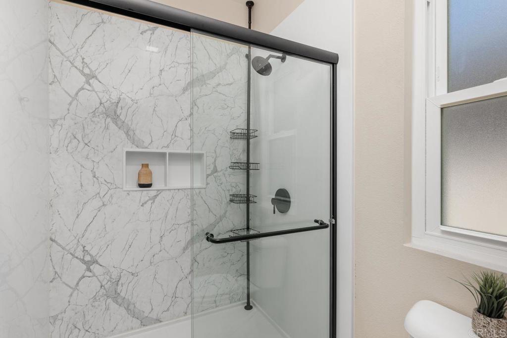 160 Belflora Way Oceanside, CA 92057 - Photo 23 of 41 a bathroom with a shower