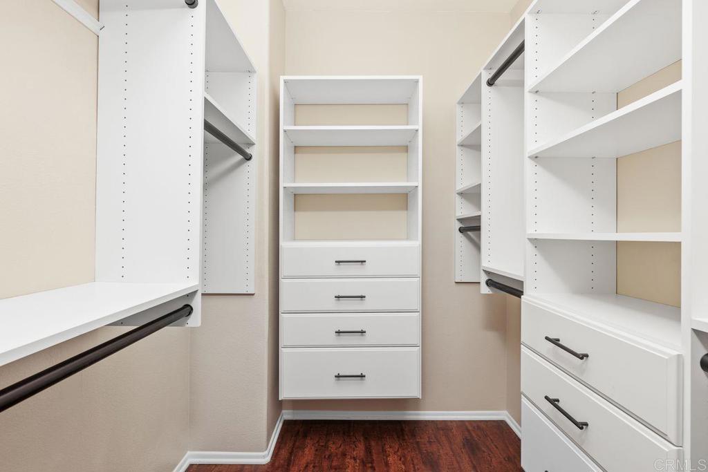 160 Belflora Way Oceanside, CA 92057 - Photo 30 of 41 a view of walk in closet with empty racks