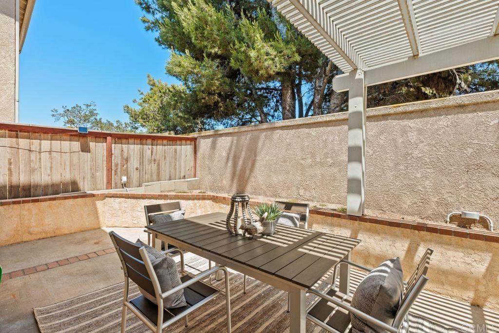 160 Belflora Way Oceanside, CA 92057 - Photo 31 of 41 a view of balcony with wooden floor and outdoor seating