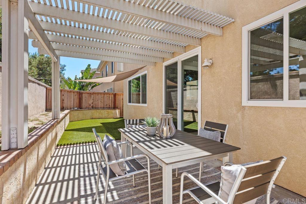 160 Belflora Way Oceanside, CA 92057 - Photo 32 of 41 a balcony with a table and chairs