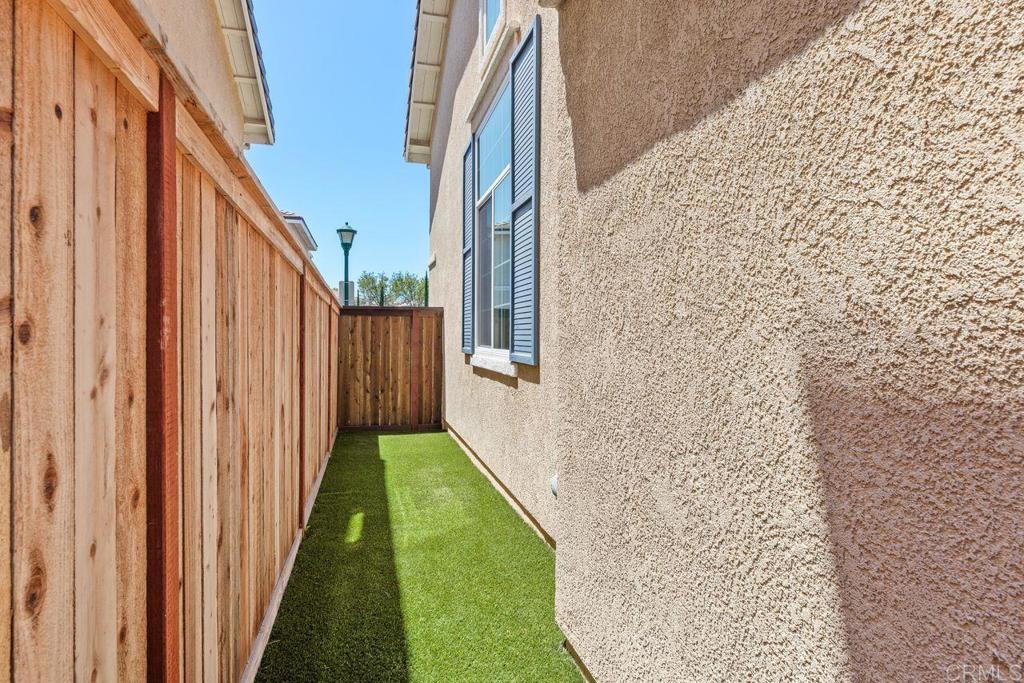 160 Belflora Way Oceanside, CA 92057 - Photo 35 of 41 a backyard of a house