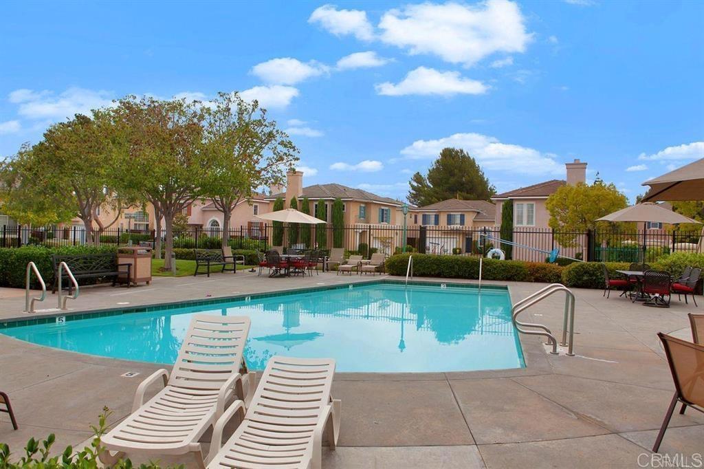 160 Belflora Way Oceanside, CA 92057 - Photo 40 of 41 a view of a swimming pool and a lounge chair