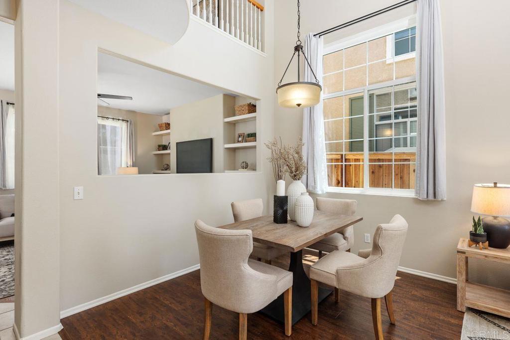 160 Belflora Way Oceanside, CA 92057 - Photo 8 of 41 a view of a dining room with furniture window and wooden floor