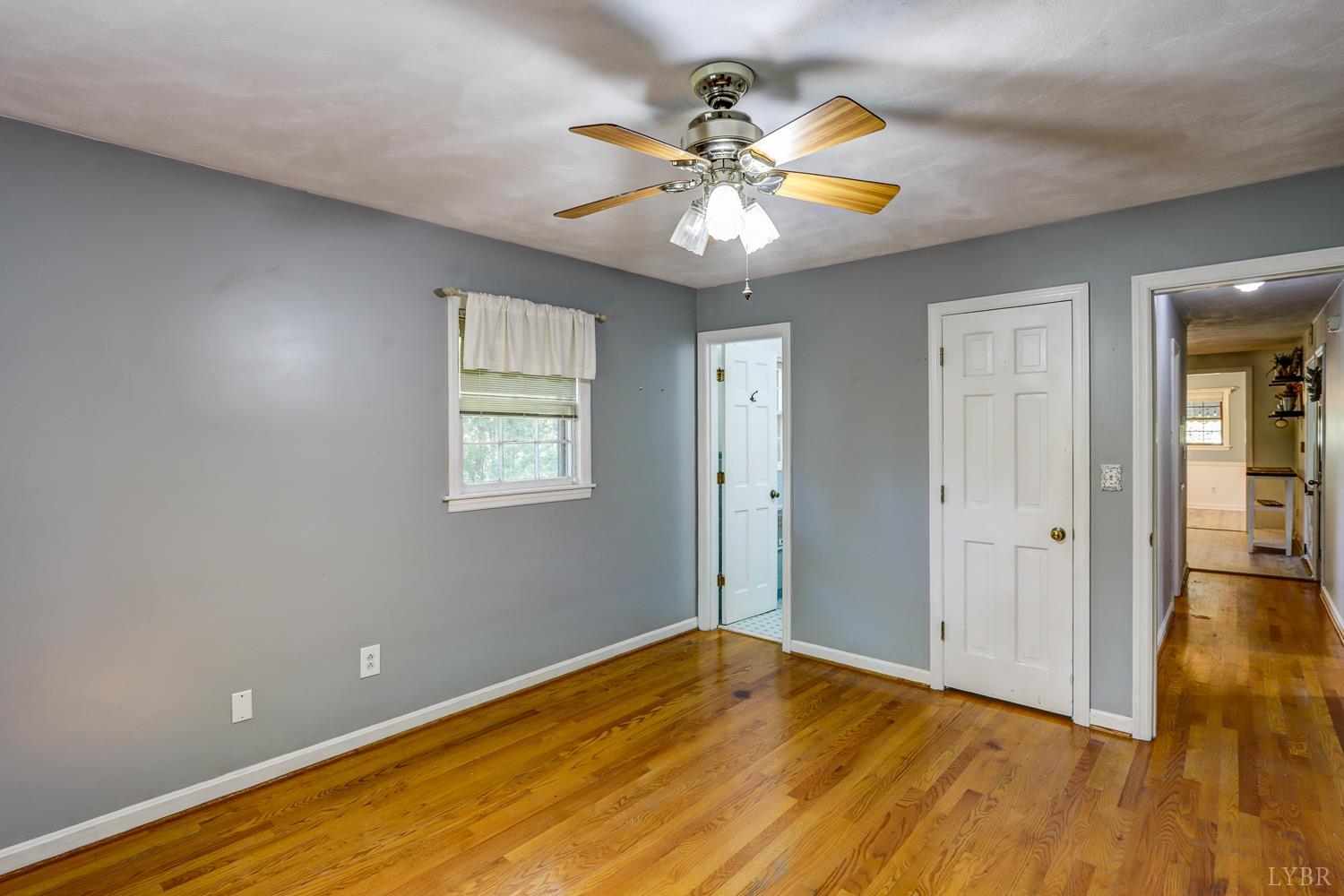 116 Bryant Road Lynchburg, VA 24502 - Photo 26 of 62 wooden floor in an empty room with a window