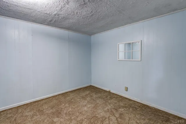 a front view of a house with a garden and porch