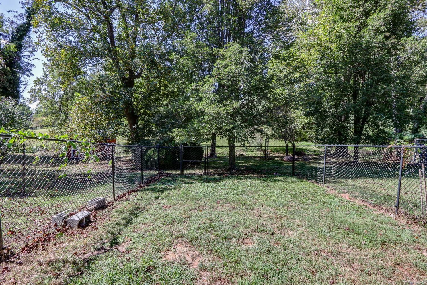116 Bryant Road Lynchburg, VA 24502 - Photo 46 of 62 a backyard of a house with lots of green space