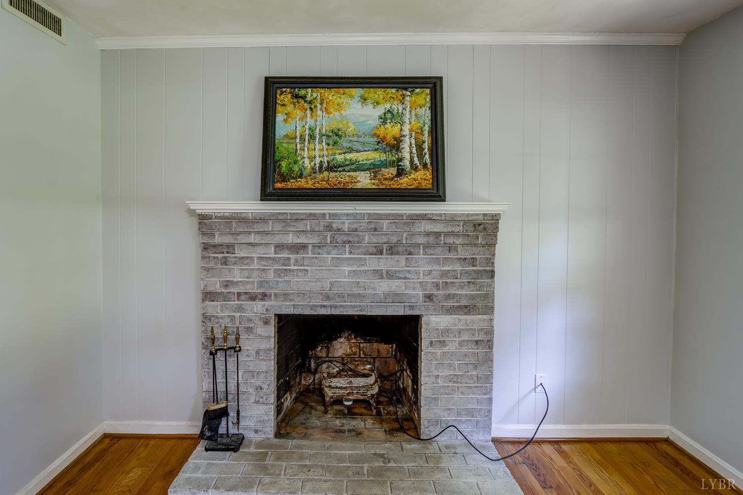 116 Bryant Road Lynchburg, VA 24502 - Photo 6 of 62 a living room with furniture and a fireplace