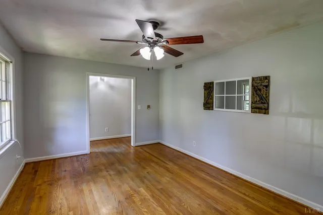 a kitchen with cabinets a counter top space stainless steel appliances and cabinets