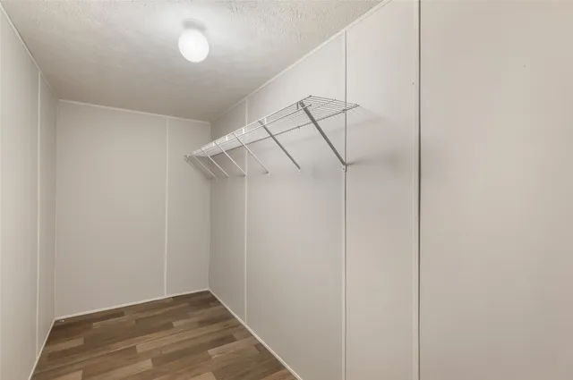 a view of a room with racks on the wall