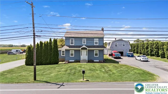 a view of a building and car parked