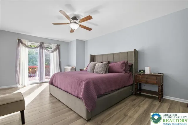 a bed room with a bed and a window