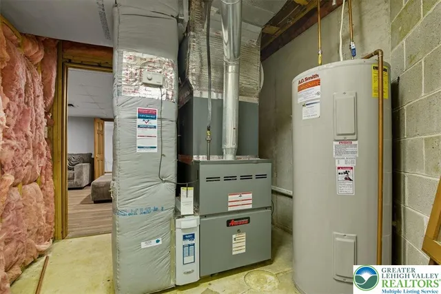 a bathroom with a mirror and a shower
