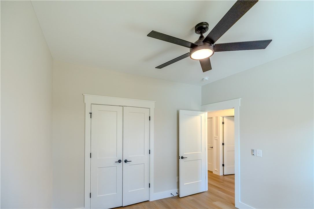 1409 Stonehurst Road Anderson, SC 29621 - Photo 23 of 37 This airy room features light wood flooring and crisp white trim.