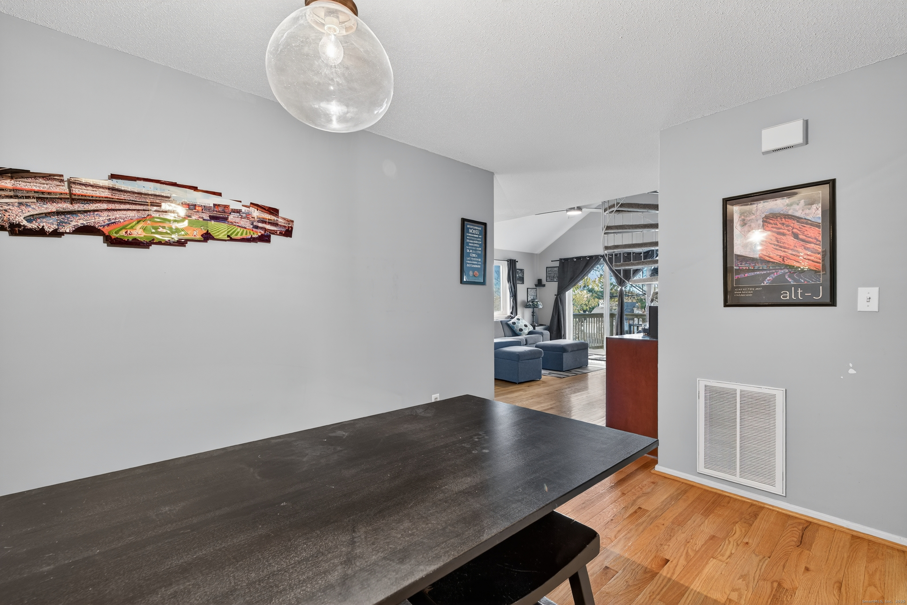 3 Sun Ridge Lane, Unit 3 Cromwell, CT 06416 - Photo 16 of 38 wooden floor in a livingroom with an outdoor space