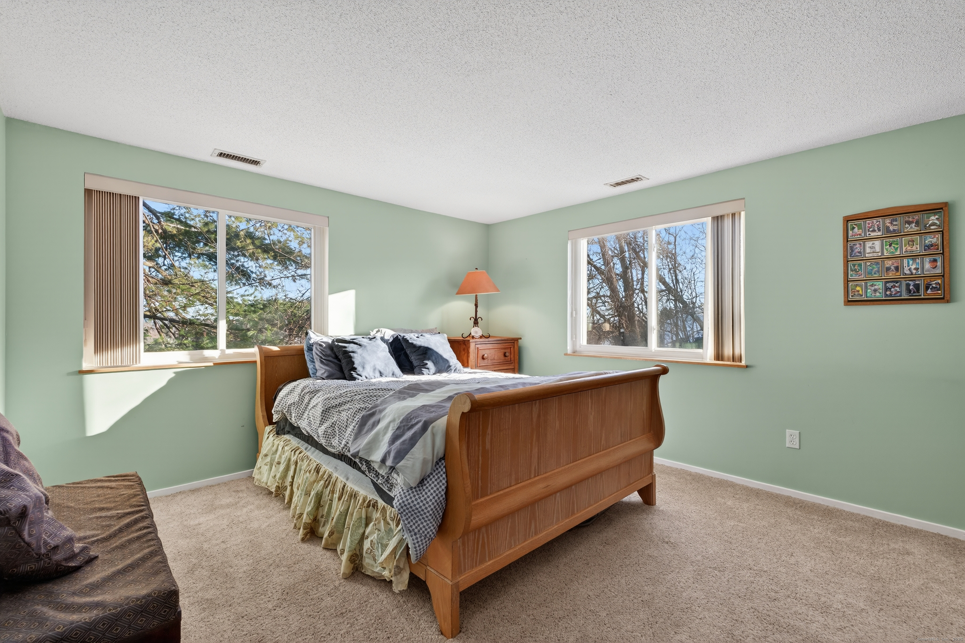 3 Sun Ridge Lane, Unit 3 Cromwell, CT 06416 - Photo 20 of 38 a bed room with a bed and a window