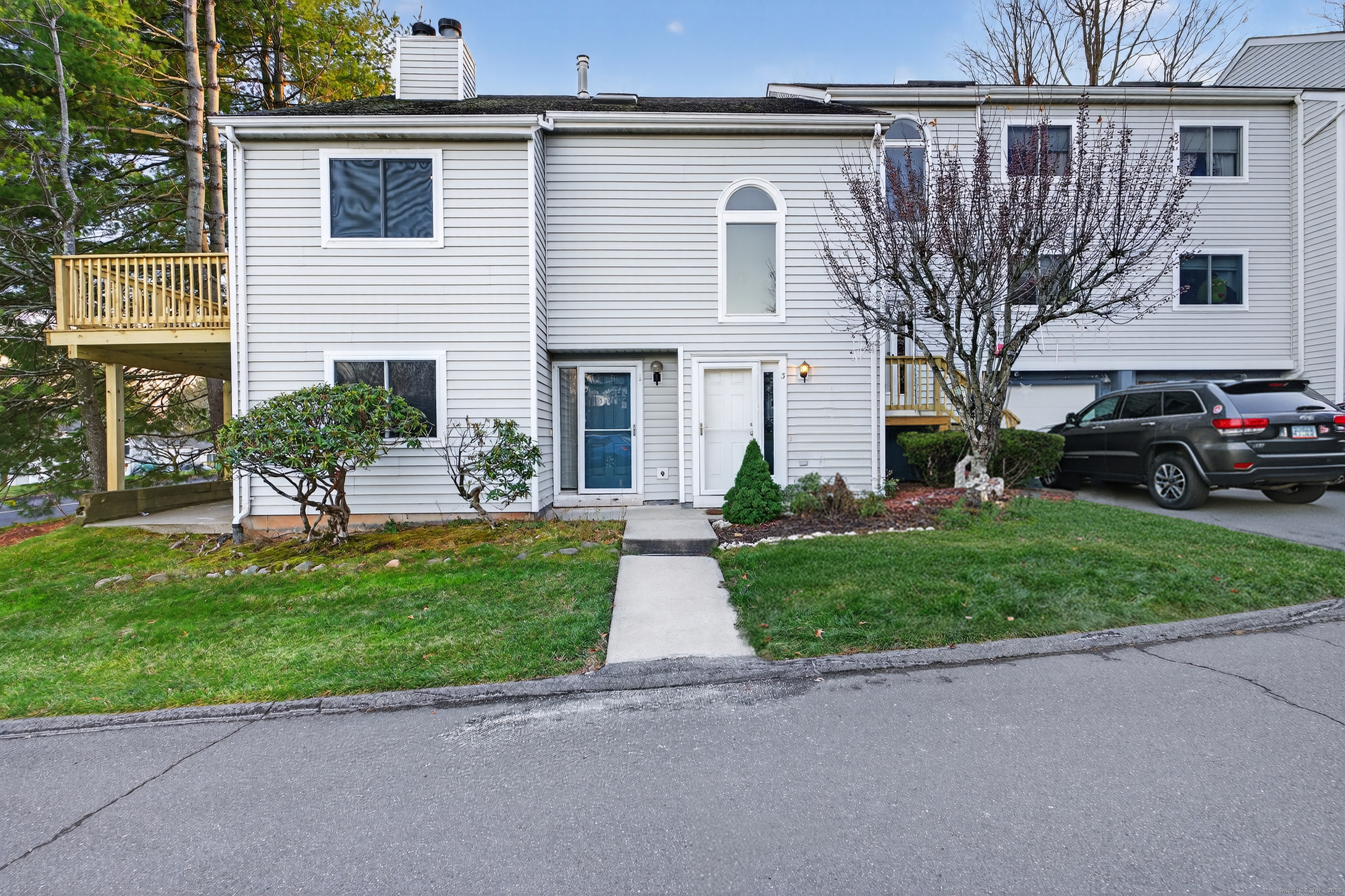 3 Sun Ridge Lane, Unit 3 Cromwell, CT 06416 - Photo 2 of 38 a view of a house with a yard