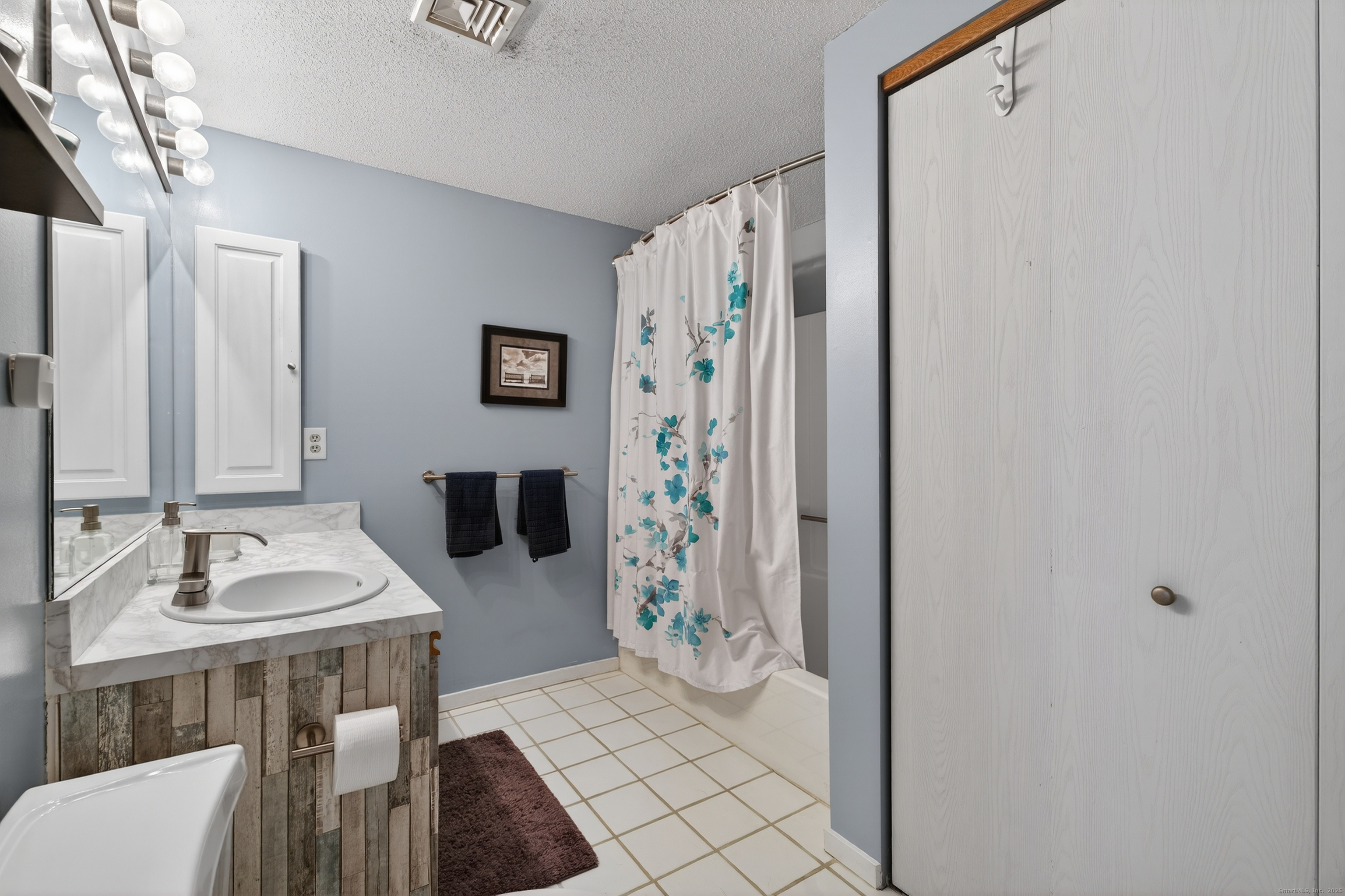3 Sun Ridge Lane, Unit 3 Cromwell, CT 06416 - Photo 25 of 38 a bathroom with a sink toilet and shower