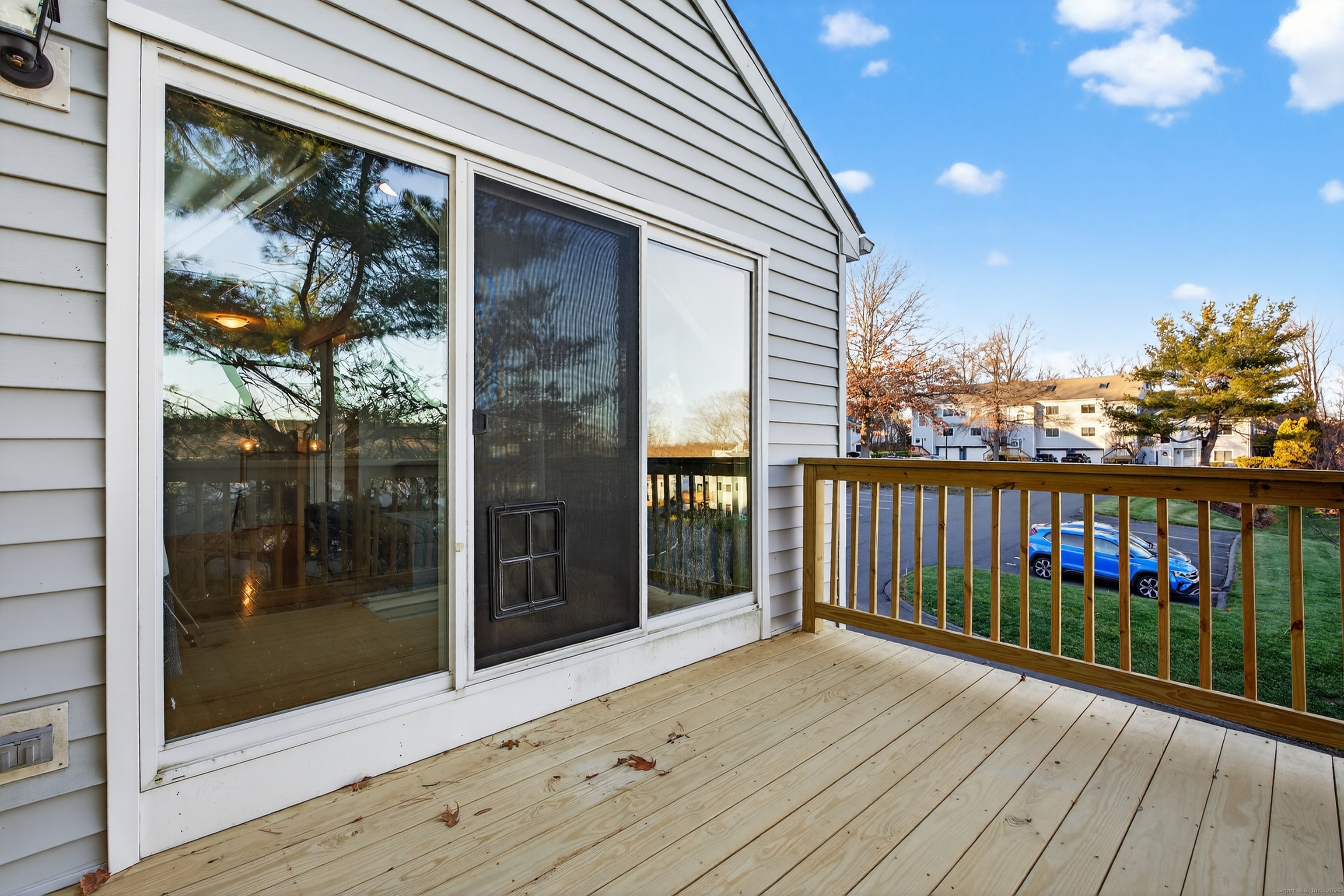3 Sun Ridge Lane, Unit 3 Cromwell, CT 06416 - Photo 34 of 38 a view of a balcony with wooden floor