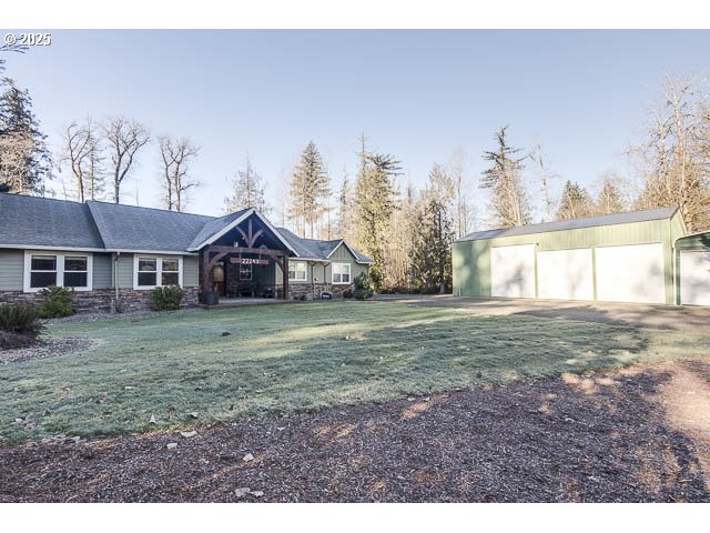 22243 Hiawatha Road Rhododendron, OR 97049 - Photo 1 of 42 a view of a house with a yard