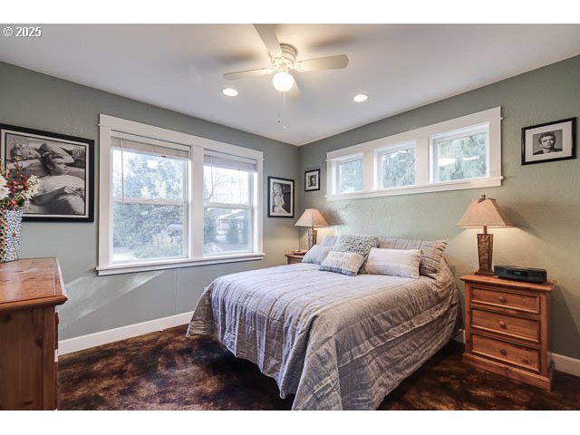 22243 Hiawatha Road Rhododendron, OR 97049 - Photo 20 of 42 a bedroom with a large bed and a window