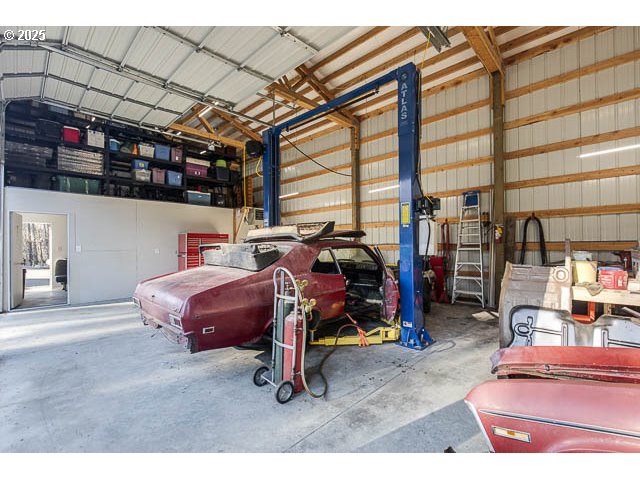 22243 Hiawatha Road Rhododendron, OR 97049 - Photo 34 of 42 a bed room with a bed and a store