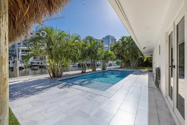 a view of a backyard with tree s