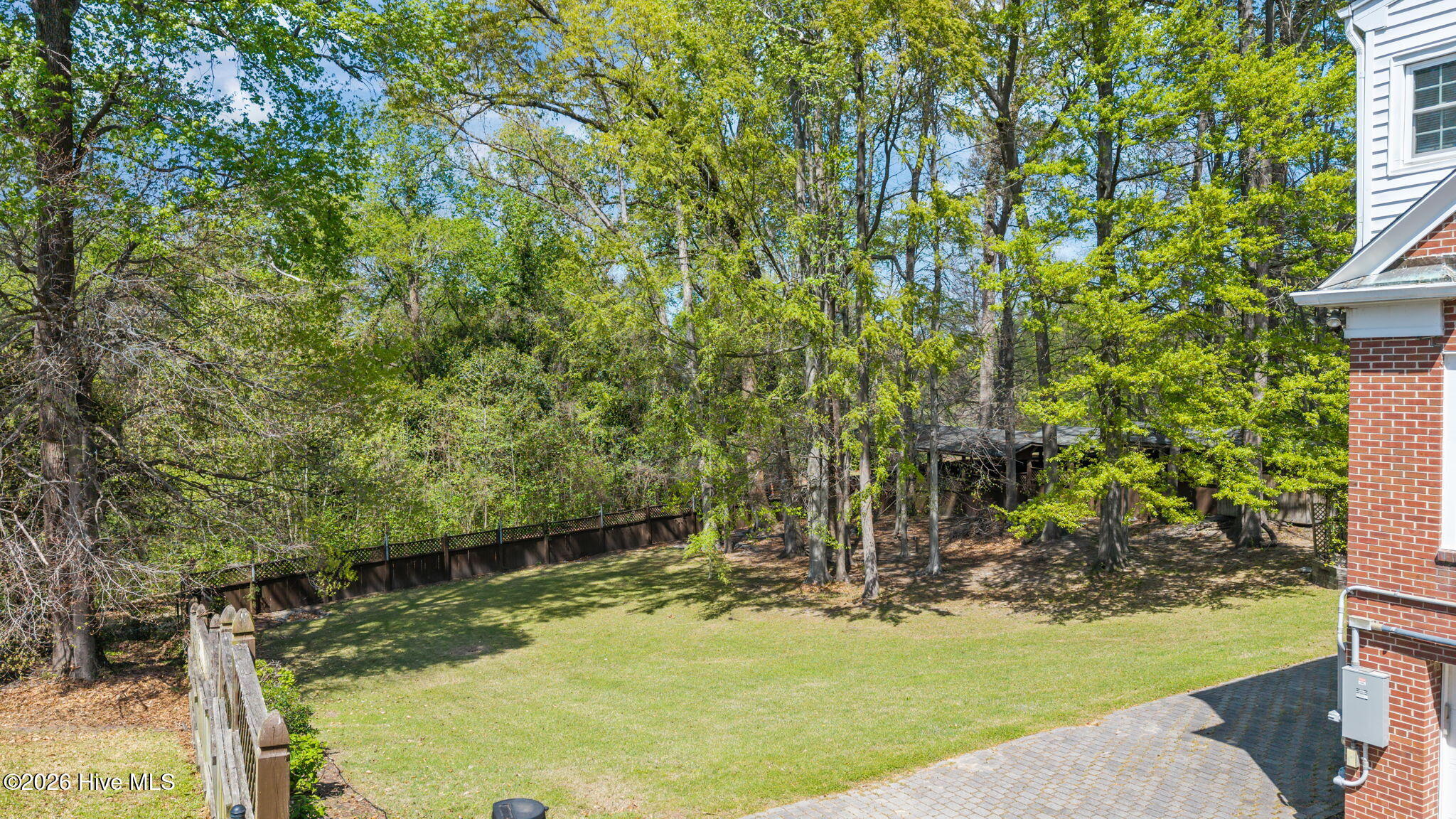 1104 West Rock Spring Road Greenville, NC 27858 - Photo 11 of 56 Returning to Spacious Back Yard
