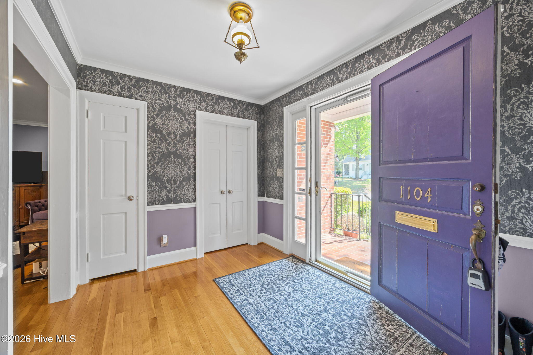 1104 West Rock Spring Road Greenville, NC 27858 - Photo 18 of 56 Foyer Entry - Living Room Left in photo-Study Center-Bedroom Hall Behind Photographer