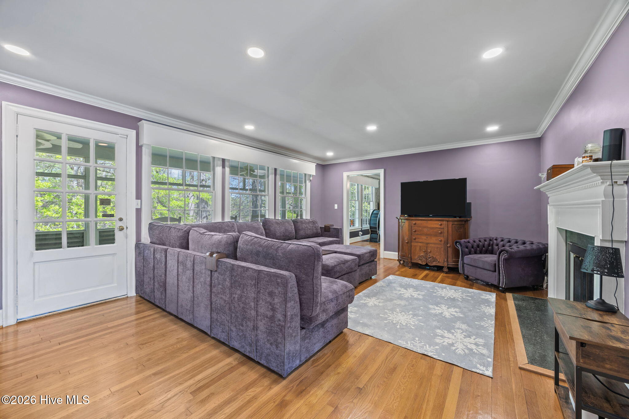 1104 West Rock Spring Road Greenville, NC 27858 - Photo 20 of 56 Wood Floor Flow through house - Living door access to upper porch