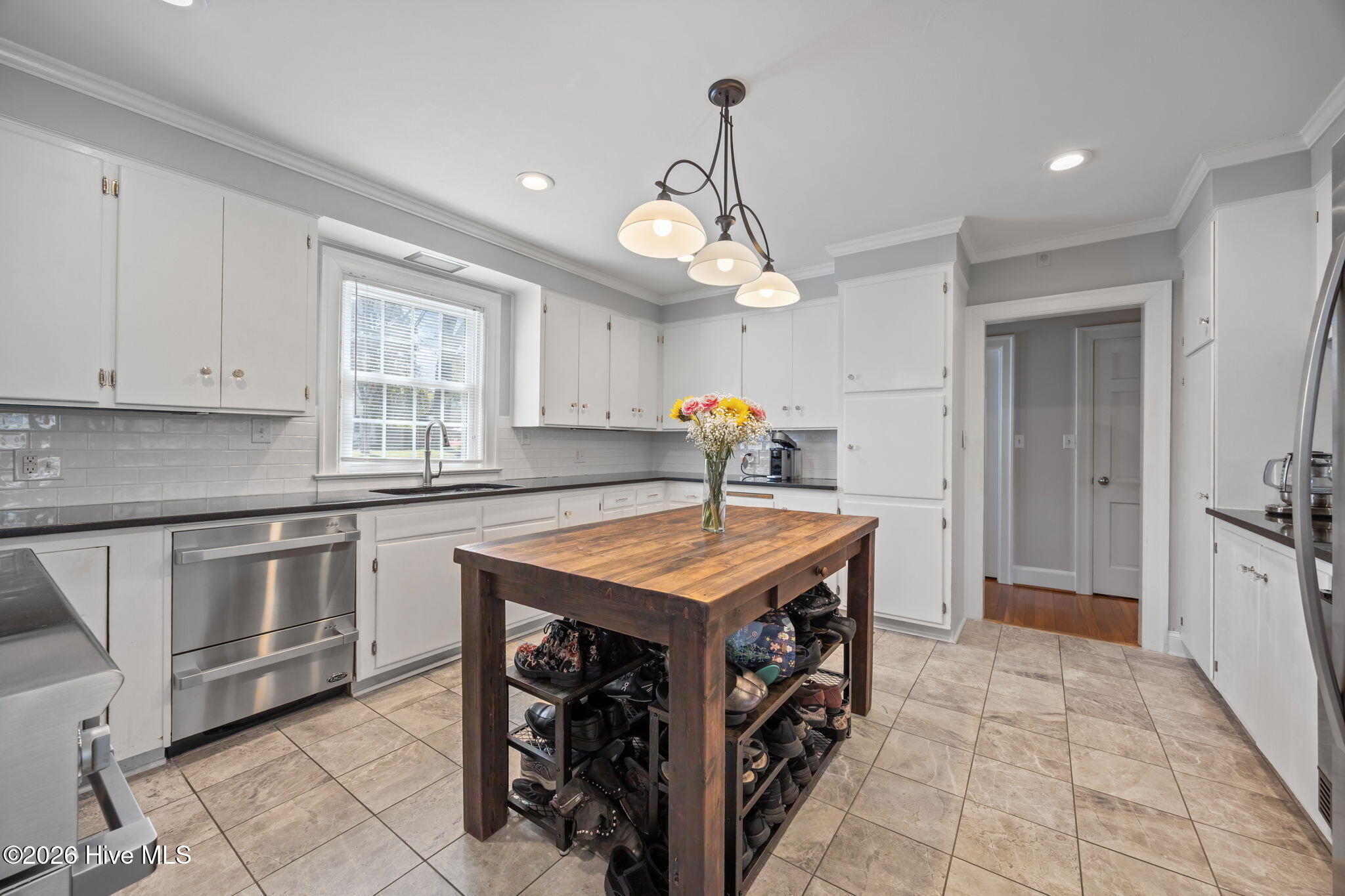 1104 West Rock Spring Road Greenville, NC 27858 - Photo 33 of 56 Door to Back Right - to /Dining/ 1/2 Bath/Study With Fireplace
