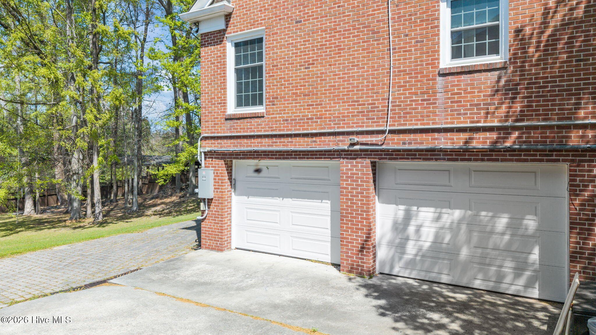 1104 West Rock Spring Road Greenville, NC 27858 - Photo 4 of 56 Drive Opens up to spacious parking pad and double garage with workspace