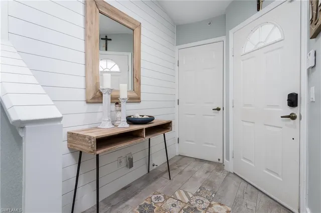 a view of a bathroom with sink and mirror