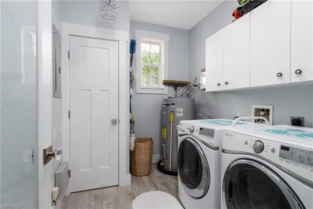 a view of entryway with washer and dryer