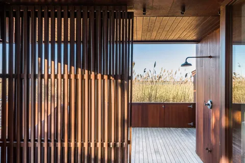 a view of a balcony with door