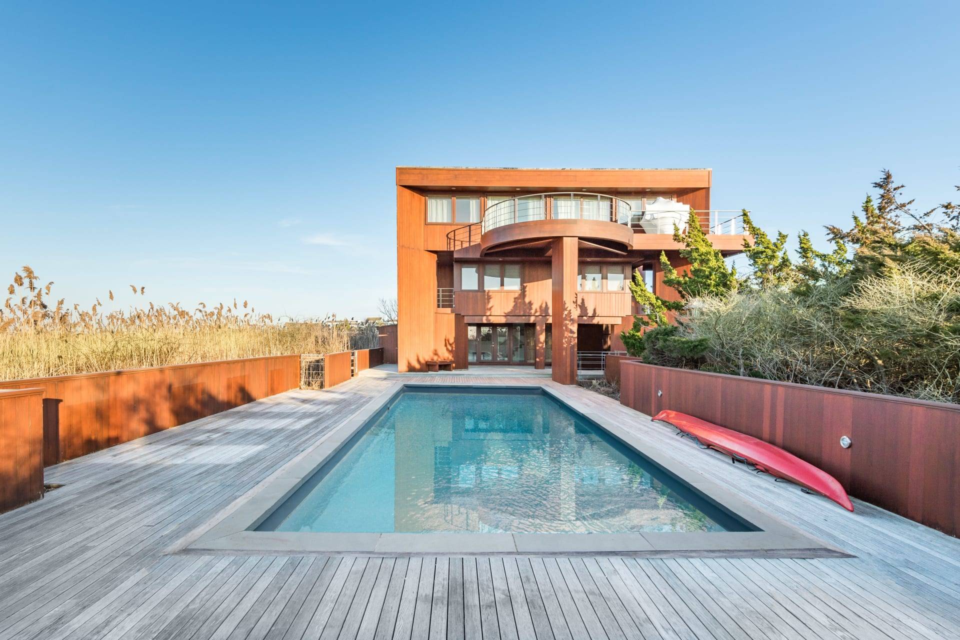 360 Dune Road Bridgehampton, NY 11932 - Photo 4 of 20 a view of balcony with two chairs