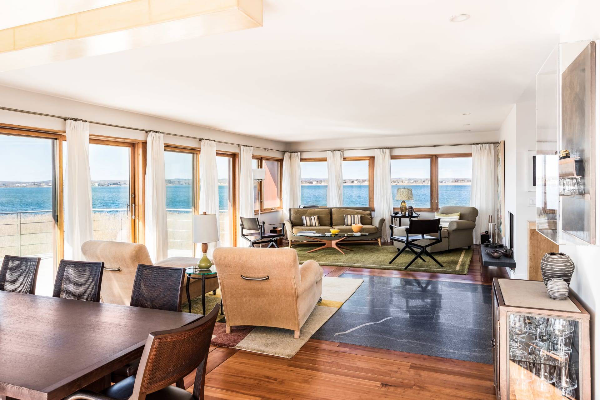 360 Dune Road Bridgehampton, NY 11932 - Photo 8 of 20 a living room with furniture and a large window