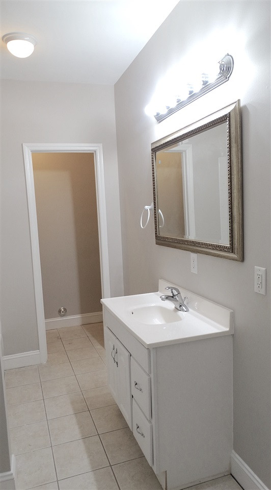 10404 Veasey Mill Road Raleigh, NC 27615 - Photo 23 of 30 Lower Level Full Bath