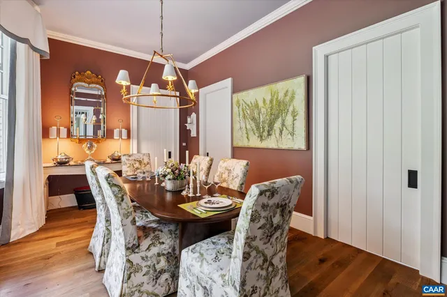 a bath tub sitting in a bathroom next to a window