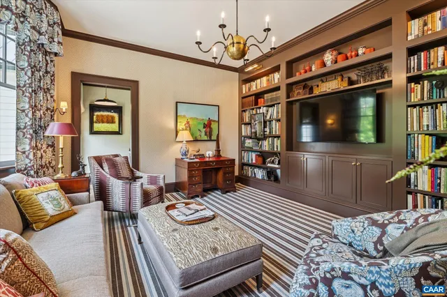 a bathroom with a sink and mirror with toilet